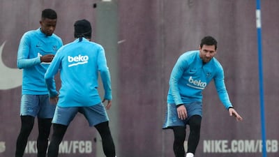 Messi makes a pass during training. AP Photo