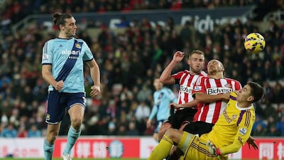 Andy Carroll of West Ham United directs a header wide of goal during the Premier League match between Sunderland and West Ham on Saturday. Chris Brunskill / Getty Images