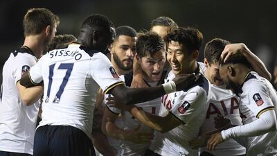 Ben Davies, centre, is congratulated by Tottenham teammates after scoring the opening goal against Aston Villa in the FA Cup third round. Toby Melville / Reuters