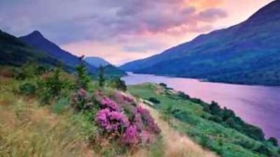 A view of Loch Leven with Pap of Glen Coe mountain in the background. More than two million visitors arrive in Glen Coe each year to climb its mountains.