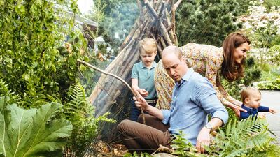 The family played together in the garden. Matt Porteous / Kensington Palace via Getty Images