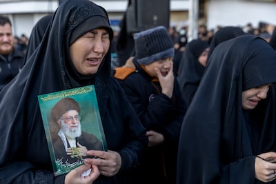 Women weep as thousands gather in Enghelab Square, Tehran for a pro-government rally after the death of Ayatollah Ali Khamenei was confirmed. Getty Images