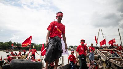 NLD supporters take part in a boat rally in the Yangon river. Reuters