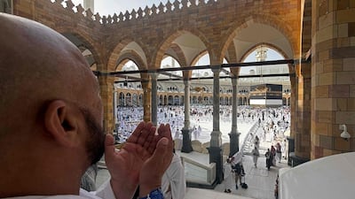 A devotee prays within sight of the Kaaba, at the Grand Mosque complex in Makkah. AFP