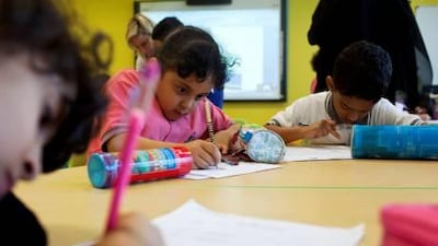 Boys and girls draw together at Mubarak bin Mohammed School, one of the country's first co-ed government primary schools.