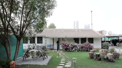The bungalow-style houses have large gardens that are seldom found in central Dubai. Pawan Singh / The National
