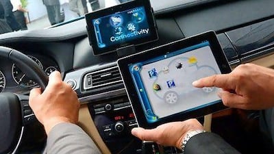 Smart gadgets are becoming smarter as developers improve their connectivity across technology platforms. Rainer Jensen / EPA