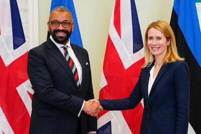 Estonian Prime Minister Kaja Kallas, right, and Britain's Foreign Secretary James Cleverly shake hands during their meeting at the Stenbock House in Tallinn. AP