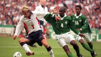 England's David Beckham shields the ball from Saudi Arabia's Abdulla Zebramawi in England's second friendly against the kingdom. The two nations have played out two draws. Tom Hevezi / PA