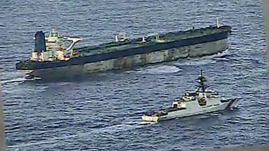 A US Coast Guard cutter Munro escorting the tanker Marinera. Its seizure could be part of a growing move against the global shadow fleet. AFP