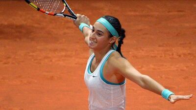 Caroline Garcia celebrates beating Ana Ivanovic at the WTA Women's Stuttgart Open on Tuesday. Marijan Murat / EPA / April 21, 2015