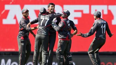 UAE all-rounder Amjad Javed, centre, insists his team are not afraid of Pakistan ahead of their Cricket World Cup encounter. William West / AFP
