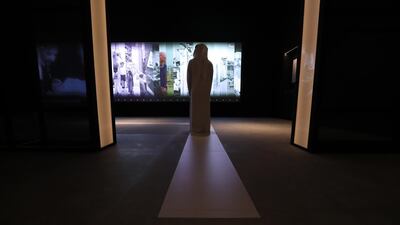 A section of the exhibition shows photographs of the UAE’s development presented through an interactive screen display. Chris Whiteoak / The National