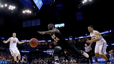 OKLAHOMA CITY, OKLAHOMA - MARCH 18: Korey Billbury #24 of the Virginia Commonwealth Rams goes after the ball in the second half against the Oregon State Beavers in the first round of the 2016 NCAA Men's Basketball Tournament at Chesapeake Energy Arena on March 18, 2016 in Oklahoma City, Oklahoma. Ronald Martinez/Getty Images/AFP== FOR NEWSPAPERS, INTERNET, TELCOS & TELEVISION USE ONLY ==