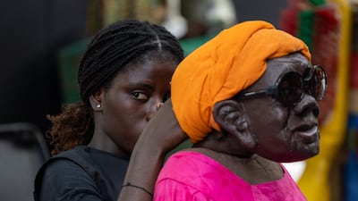 A Senegalese artist performs in the Keur Mame Boye puppet show at the Djarama Festival in Dakar, Senegal. EPA