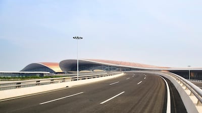 Beijing Daxing International Airport features a bronze roof, and a sprawling curved design. Courtesy Hufton+Crow