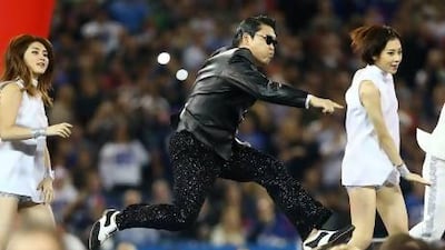 Psy performs at halftime during the Seattle Seahawks NFL game against the Buffalo Bills at Rogers Centre in Toronto, Ontario, Canada. Tom Szczerbowski / Getty Images / AFP