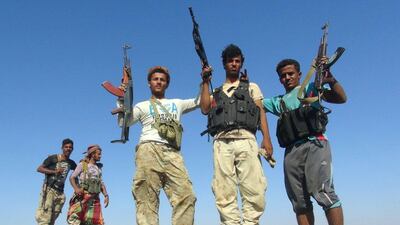 Armed Yemeni tribesmen from the Popular Resistance Committees, which is loyal to Yemen’s Saudi-backed president Abdrabu Mansur Hadi, flash their guns in the Dabab district in Taez province on November 17, 2015. Recapturing the strategic province of Taez would help pro-government forces to secure the unstable south and pave the way to the north, including the capital Sanaa, according to analysts. Nabil Hassan / Agence France-Presse