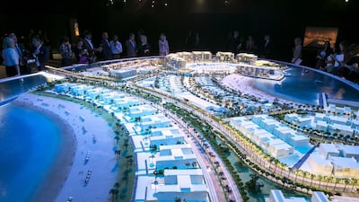 People view a model of Meraas’ new project. Reem Mohammed / The National