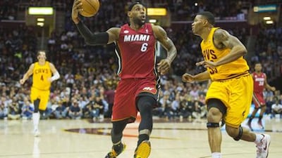 Miami Heat's LeBron James drives past Cleveland Cavaliers' Alonzo Gee.