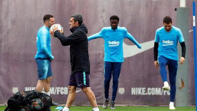 Manager Ernesto Valverde oversees training. EPA