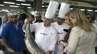 Pascal Sfara chooses a tuna for lunch. Silvia Razgova / The National