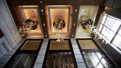 There are seven restaurants at the St Regis hotel complex. Christopher Pike / The National