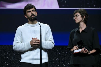 Naza directors Yuval Abraham, left, and Rachel Szor accept their Special Jury Prize at the Venice Film Festival. AFP
