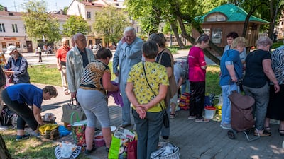 Shopping for basic commodities at a market in Lviv, Ukraine. The country's GDP posted 5 per cent growth in 2023, and is expected to expand between and 4 per cent in 2024, according to International Monetary Fund estimates. EPA