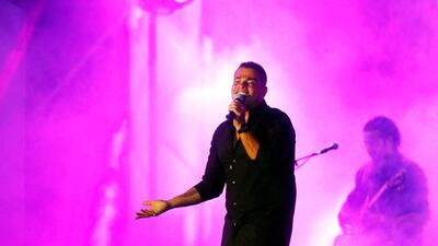 Egyptian pop star Amr Diab performs at the newly built Jeddah Superdome, in Jeddah, Saudi Arabia on June 18, 2021. The concert is organised by the Saudi General Entertainment Authority after the kingdom lifted coronavirus restrictions on events in May. AP Photo