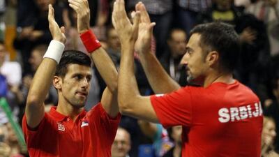 Men’s world No 1 Novak Djokovic, left, stepped in for Viktor Troicki to partner Nenad Zimonjic and Serbia to an untouchable 3-0 lead in their Davis Cup tie against Croatia yesterday. Kole Sulejmanovic / EPA