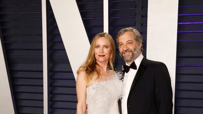 Leslie Mann in Ralph & Russo and Judd Apatow arrive at the 2019 Vanity Fair Oscar Party. Reuters