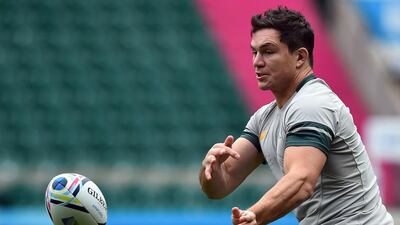 South Africa's back row forward Francois Louw passes the ball during the captain's run at Twickenham Stadium. AFP