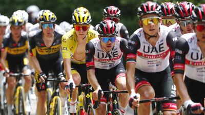 Tadej Pogacar with UAE Team Emirates teammates.