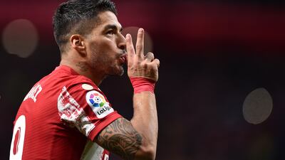 Luis Suarez of Atletico Madrid celebrates after scoring his team's second goal. Getty Images