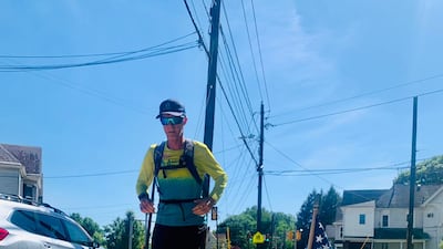 Former American University of Sharjah prof Nick Ashill completes a trans-American run from the spot where he was almost killed in a hit-and-run incident in 2017. Photo: Nick Ashill