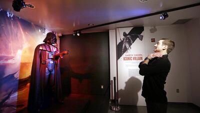 Project director Saul Drake stands-in where visitors are likely to want their photo taken in front of a Darth Vader costume. AP