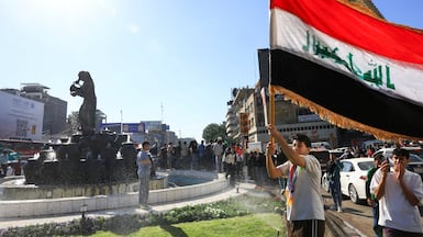 Iraqis celebrate on the streets of Baghdad on April 1 after the country qualified for the World Cup. Reuters