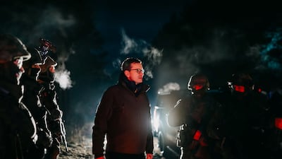 Poland's Prime Minister Mateusz Morawiecki visits the scene near the border, outside the Polish town of Krynki. Reuters