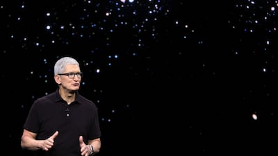 Mr Cook presents the new iPhone 14 at the event. Reuters
