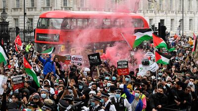 Pro-Palestinian demonstrators attend a protest in London, following a flare-up of Israeli-Palestinian violence. Reuters