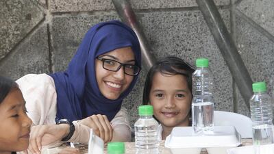 Mariam Al Kuwaiti says meeting Filipino children who struggle to get enough to eat has prompted her to change her habits and stop throwing food away. Courtesy Beyond Borders