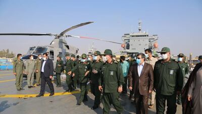Head of Iranian revolutionary guard corps Hossein Salami (c) and other officials take part in an inauguration ceremony for a warship named after slain Guard naval commander Abdollah Roudaki. IRGC handout via EPA.