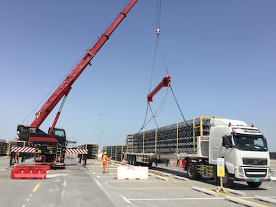 The Expo entry portals are divided into sections, transported on trailer trucks from Germany to Antwerp then shipped to Jebel Ali and on to the Expo site in Dubai.
