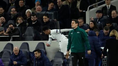 Dele All gets angry as he is being substituted by Tottenham's Erik Lamela. AP