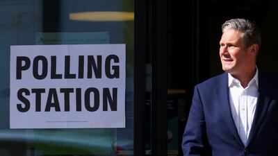 Britain's Labour Party leader Keir Starmer leaves a polling station after casting a vote in London. Reuters