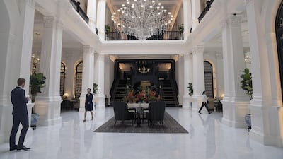 People walk through the lobby of the Raffles Hotel, operated by Accor SA, in Singapore. Raffles, which hosted a grand reopening festival following an extensive renovation that brought the icon into the 21st century, has hosted everyone from Somerset Maugham and Rudyard Kipling, to Elizabeth Taylor and King Edward VIII. From humble beginnings in 1887, it now houses a variety of restaurants, bars and numerous upscale shops, in addition to its luxury suites. Bloomberg