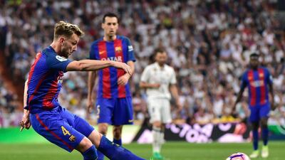 Rakitic shoots to score. Gerard Julien / AFP