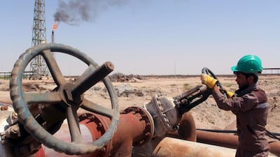 A worker checks the valve of an oil pipe at Al Sheiba oil refinery in Basra. Iraq has unusually published detailed data on production from all of its oilfields. Essam Al Sudani / Reuters
