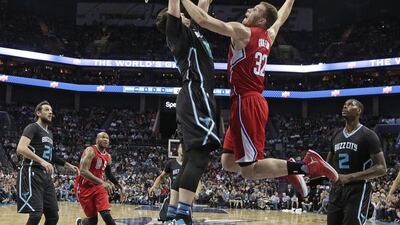 Los Angeles Clippers’ Blake Griffin goes up to dunk against Charlotte Hornets’ Miles Plumlee in the first half of an NBA basketball game in Charlotte. Chuck Burton / AP Photo